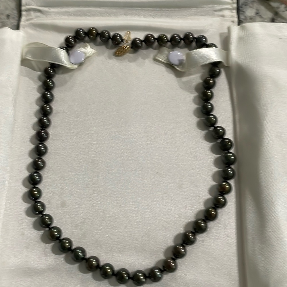 Natural genuine, black seas pearls.